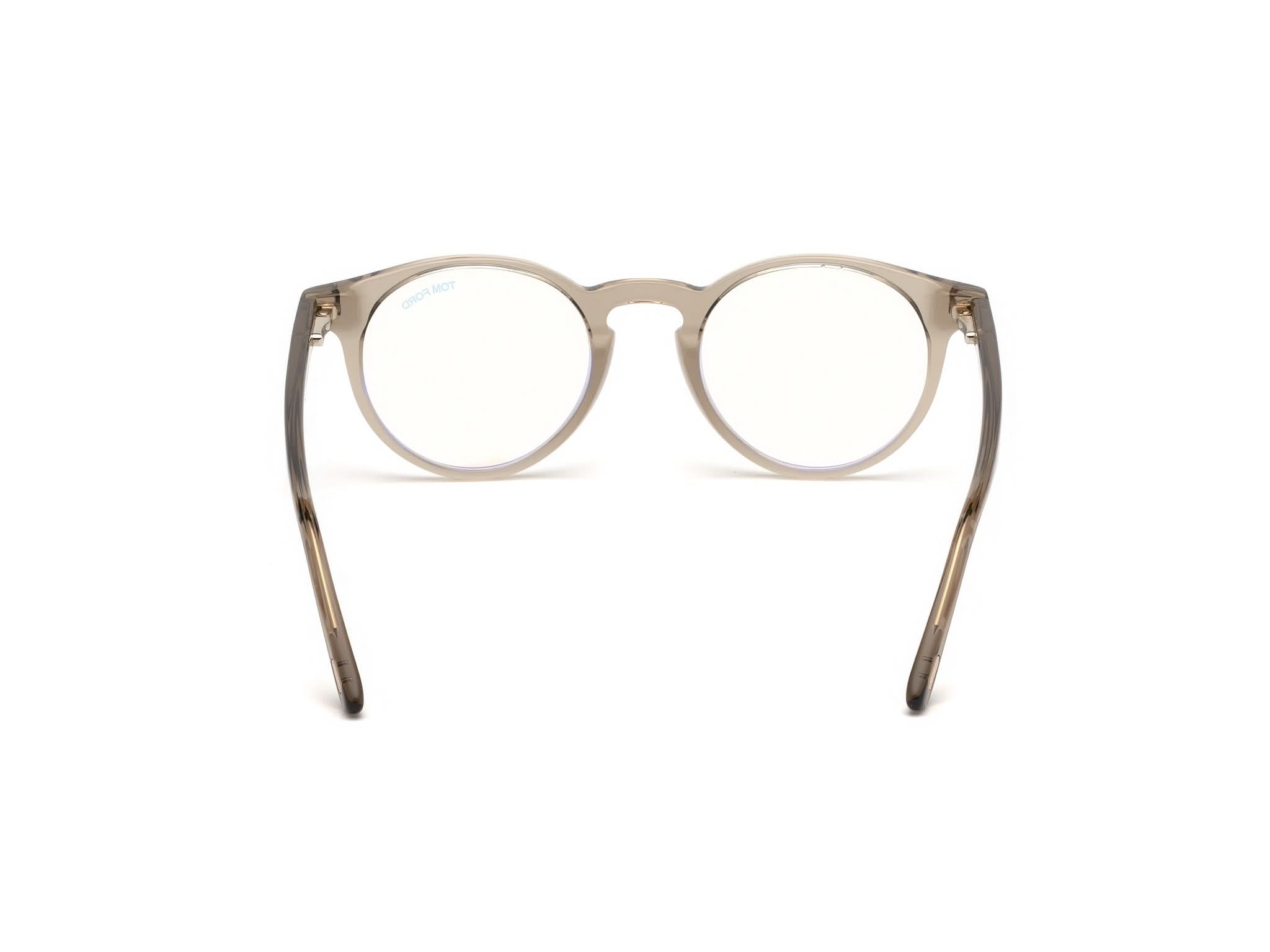 Back view of Tom Ford FT5557 1#color_Shiny Translucent Light Brown