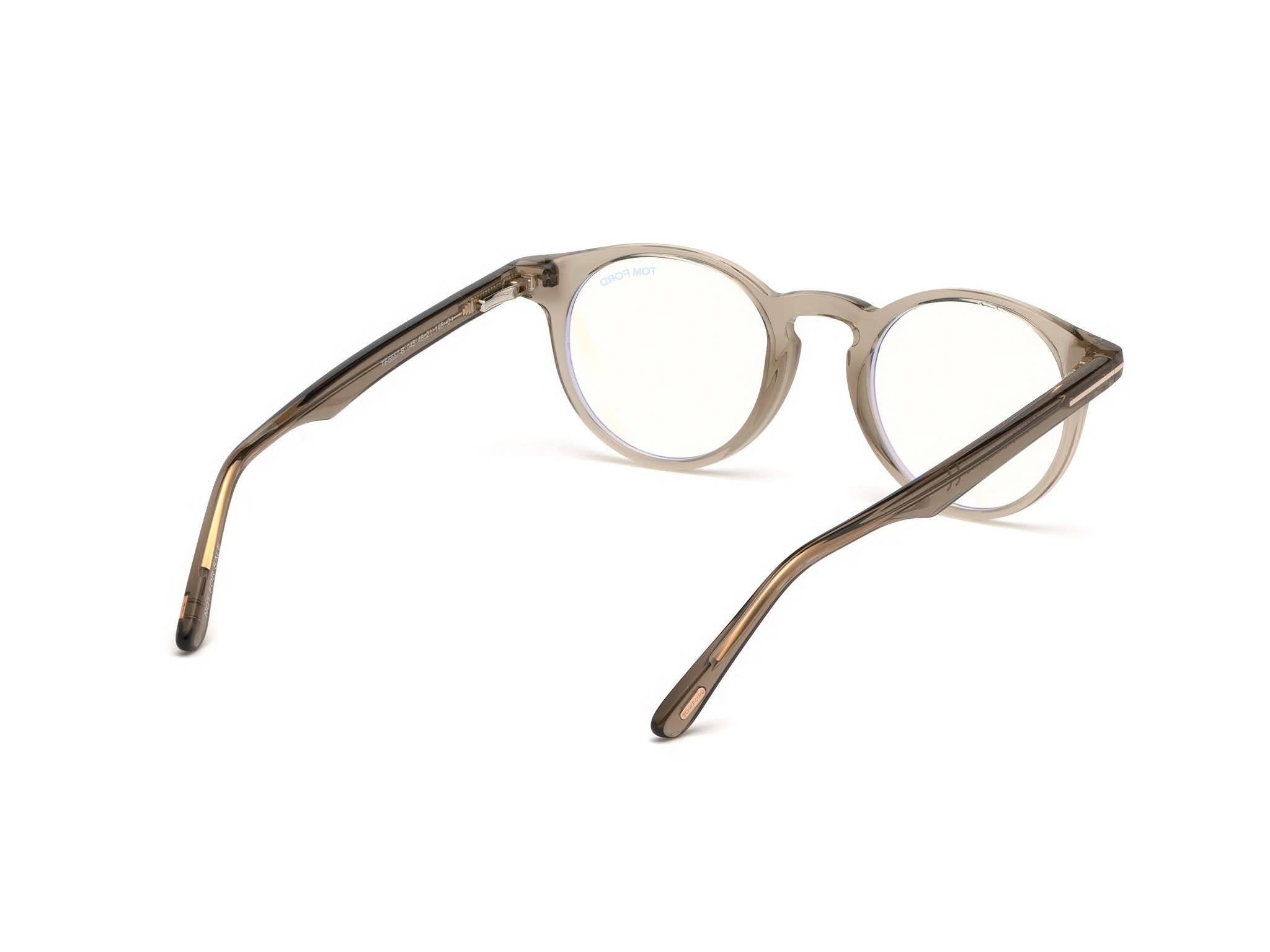 Side View of Tom Ford FT5557 1#color_Shiny Translucent Light Brown