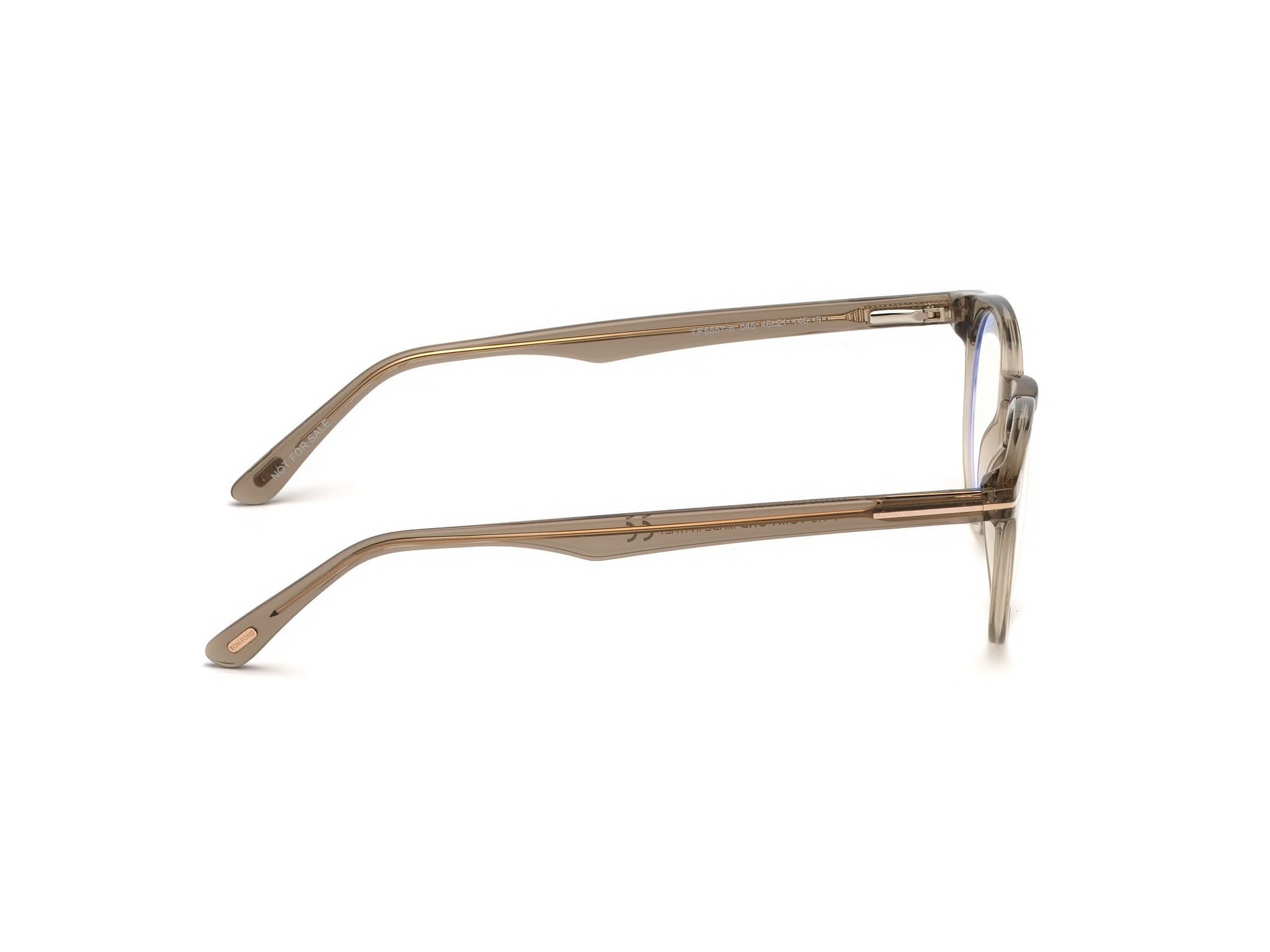 Right side view of Tom Ford FT5557 1#color_Shiny Translucent Light Brown