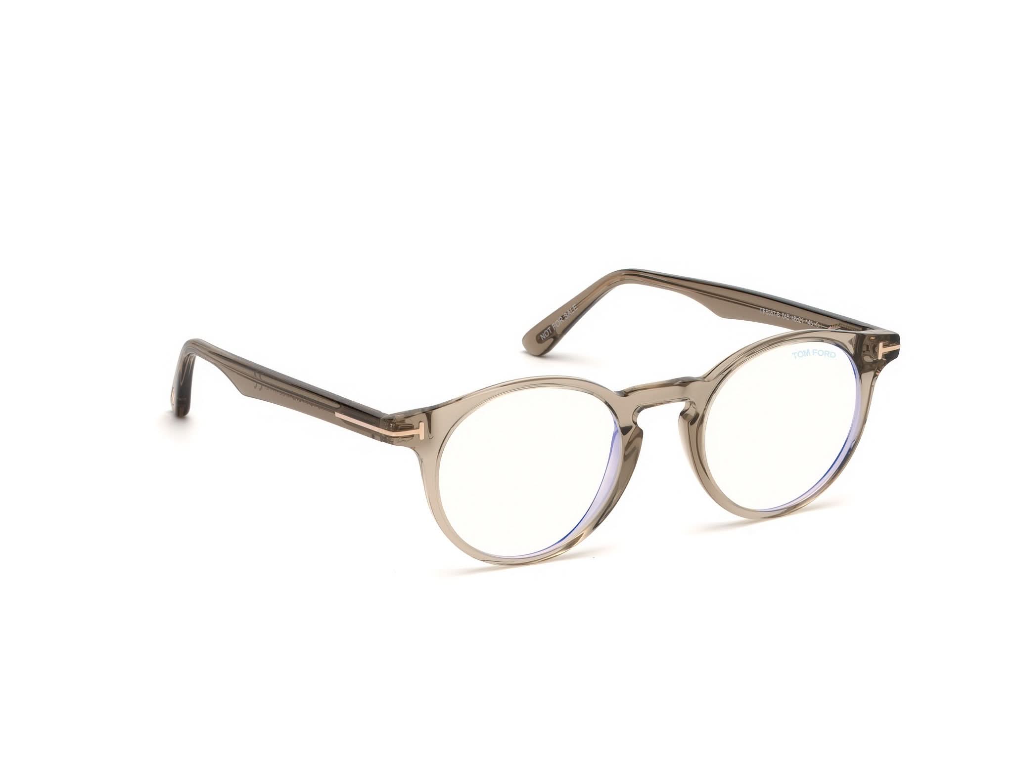 Side Front view of Tom Ford FT5557 1#color_Shiny Translucent Light Brown