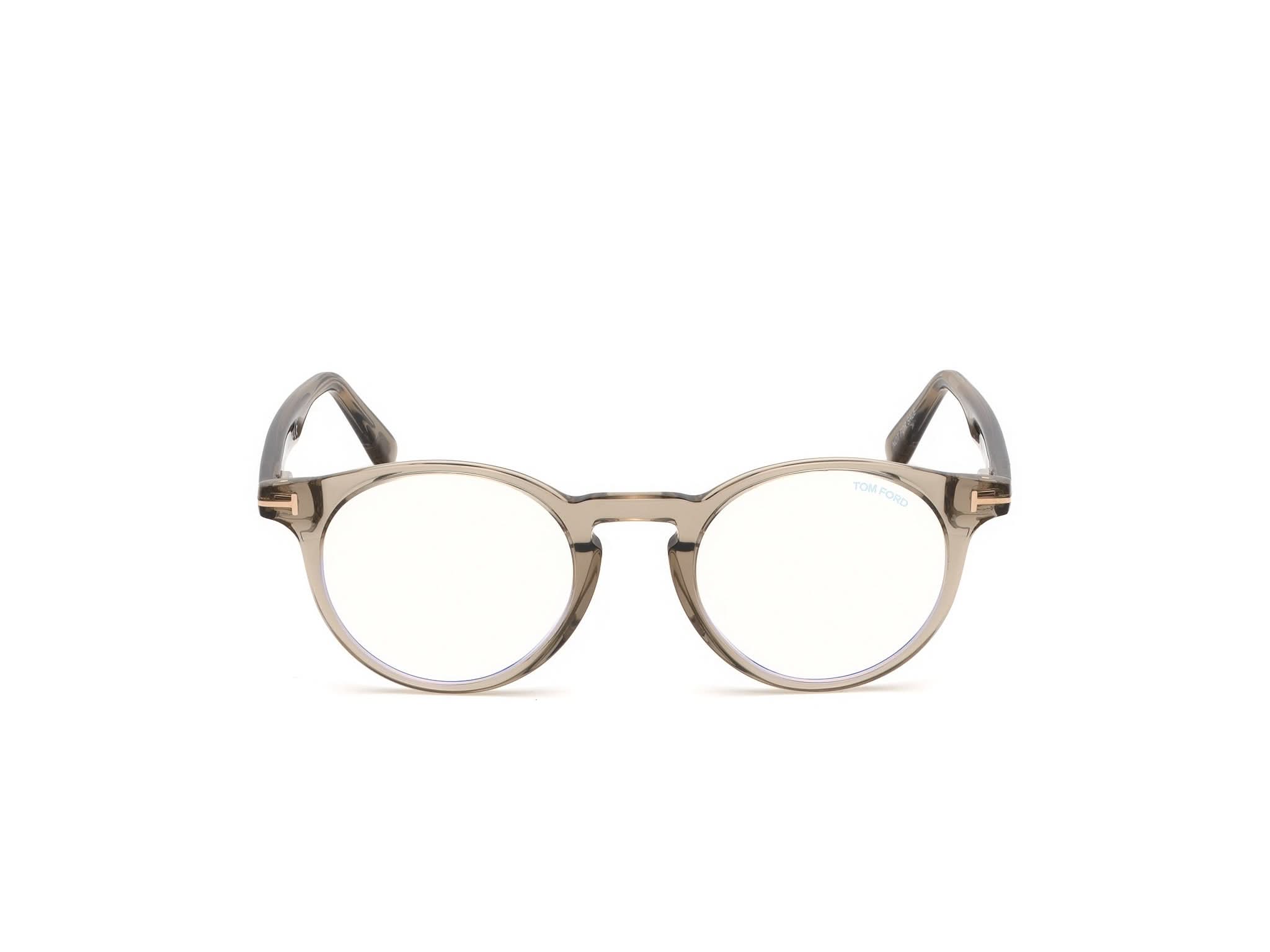 Front view of Tom Ford FT5557 1#color_Shiny Translucent Light Brown 