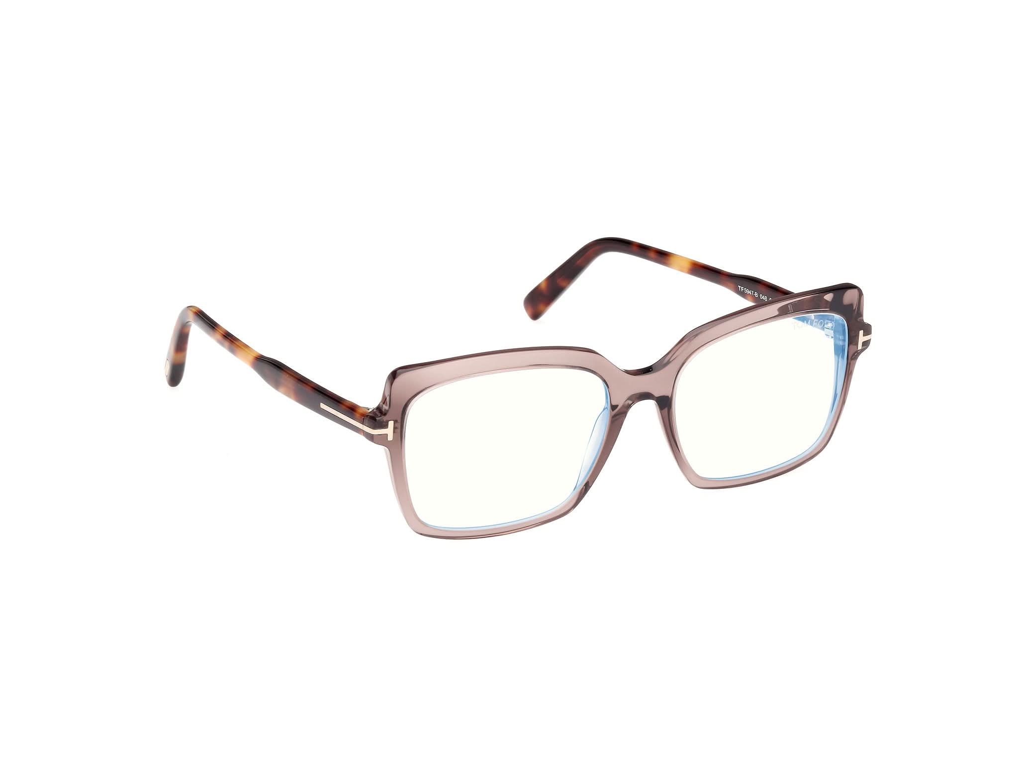 Diagnoal Side view of Tom Ford FT5938 1#color_matte blue